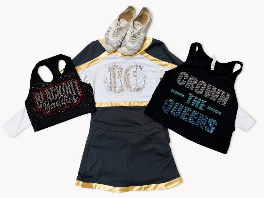 My cheer shoes, uniform and practice gear represent a staple that became part of my routine during years of All-Star Cheerleading. They introduce a sport that required preparation, consistency, and commitment. Photograph by Maddy Logan, [August 20th, 2026].